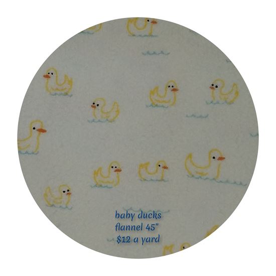 Picture of flannel pale yellow with ducks a nd waves